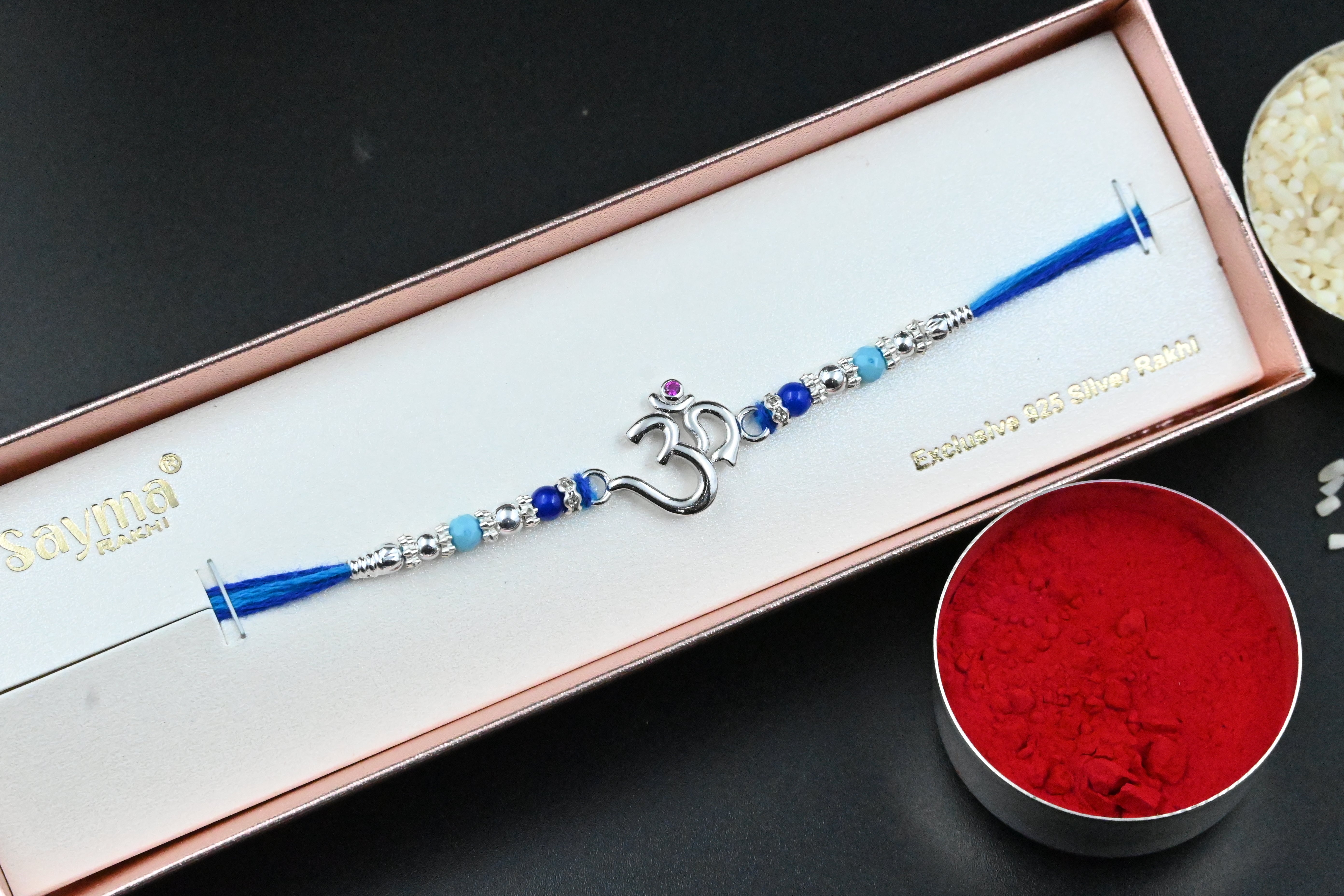 Om Silver Rakhi